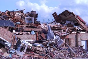 Four people attended Sunday services outside the building remains of West Liberty Christian Church in Kentucky following the tornado on March 2. Photo credit: Lynette Nyman/American Red Cross