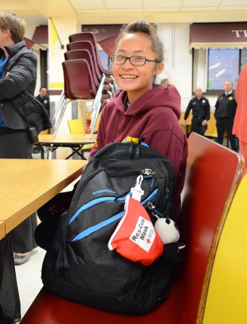 Roosevelt High School student Kalia Vang, 17, is one of 11 youth who successfully complete the school’s first American Red Cross Emergency Medical Response (EMR) course. She received her course certificate from the Red Cross on Tuesday, October 28, 2014 in Minneapolis. Photo credit: Lynette Nyman/American Red Cross