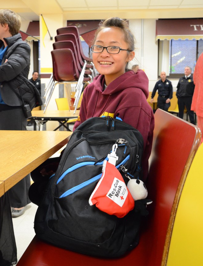 Roosevelt High School student Kalia Vang, 17, is one of 11 youth who successfully complete the school’s first American Red Cross Emergency Medical Response (EMR) course. She received her course certificate from the Red Cross on Tuesday, October 28, 2014 in Minneapolis. Photo credit: Lynette Nyman/American Red Cross