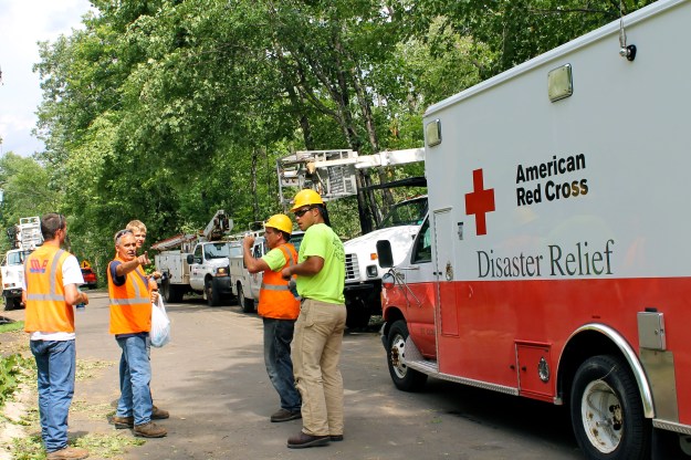 To date, the Red Cross has distributed thousands of bottles of water and hundreds of pounds of ice to Brainerd Lakes area residents and work crews cleaning up in hot and humid conditions following the windstorm. July 15, 2015. Photo credit: Vivian Engen/American Red Cross.