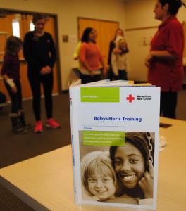 Learning materials are provided by the American Red Cross to aid in the education of all attendees (Handbook, Reference Guide, Student Kit). Photo credit Krista Weiler/American Red Cross, Minneapolis, Minn., Feb. 2015.