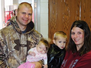 Jake and Bobbie Sievers, and their son (r), survived a house fire in Plainview, MN, in 2014. Photo credit: Richard Underdahl-Peirce/American Red Cross. 