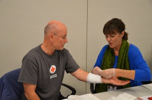 Terrance Schoonover (left) of Rochester and Terri O'Grady of Edina practiced their first aid skills during a First Aid and CPR class at the Institute.