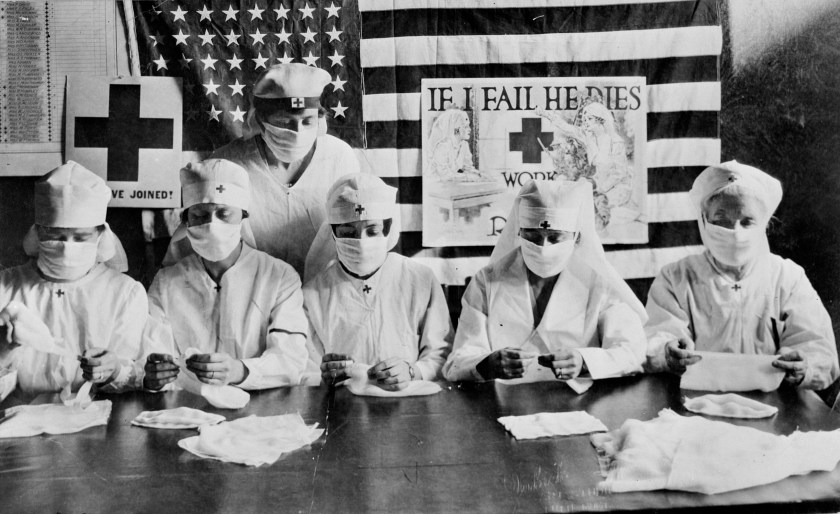 Red Cross volunteers make influenza face masks during the influenza epidemic in 1918. Photo: American Red Cross Photo Library